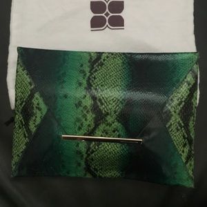 NWOT BCBG leather excellent condition, 11”x8”